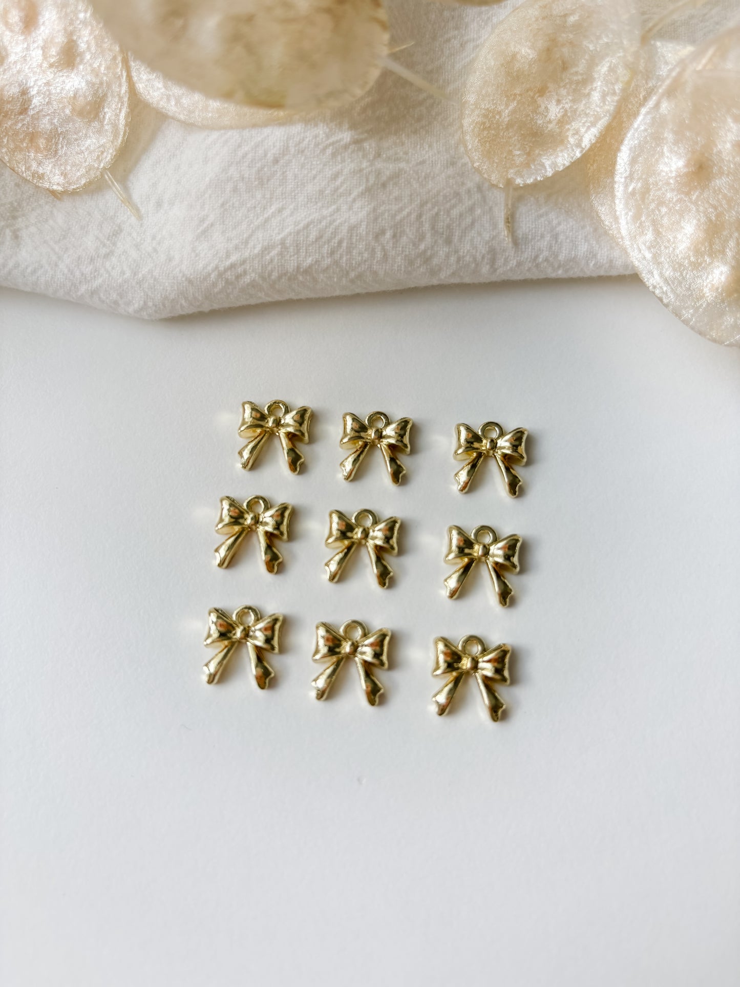 Pendant bow 11x10.5x3mm, 1pc