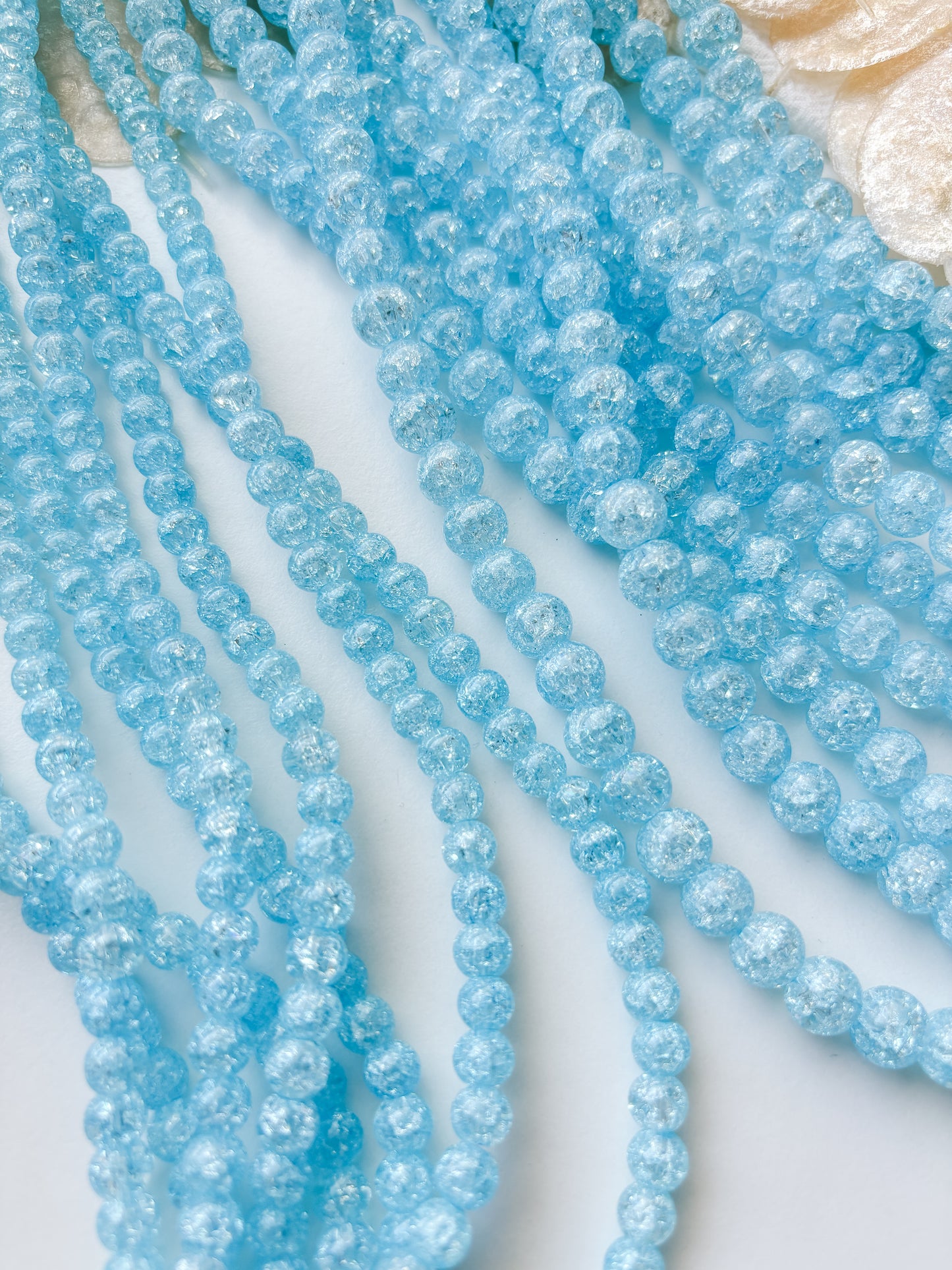 Glass bead, light blue