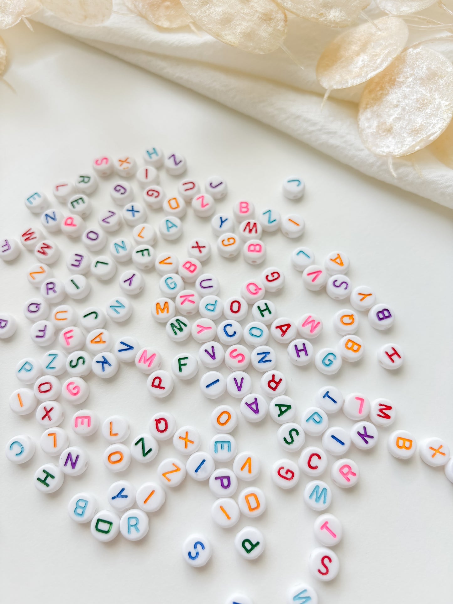 Bead alphabet 7x3mm, approx. 280pcs
