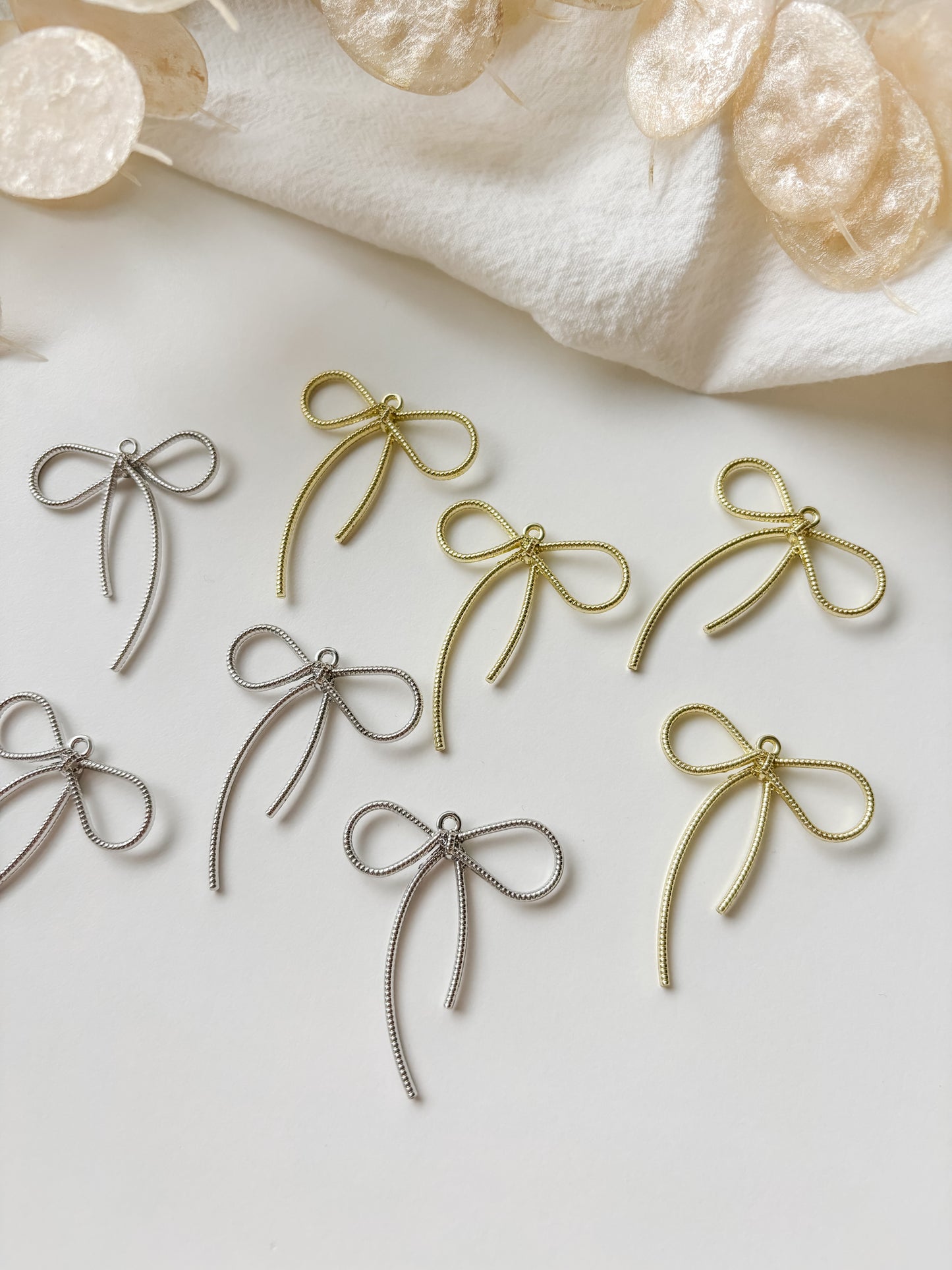 Pendant bow 43x36mm, 1pc
