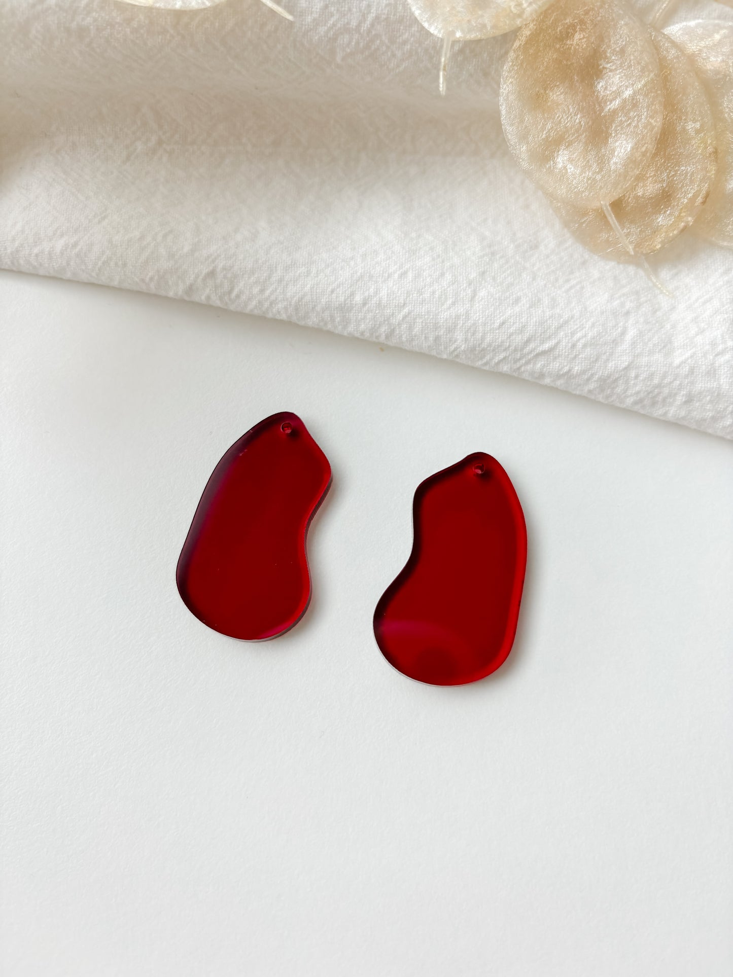 Pendant red transparent 40mm