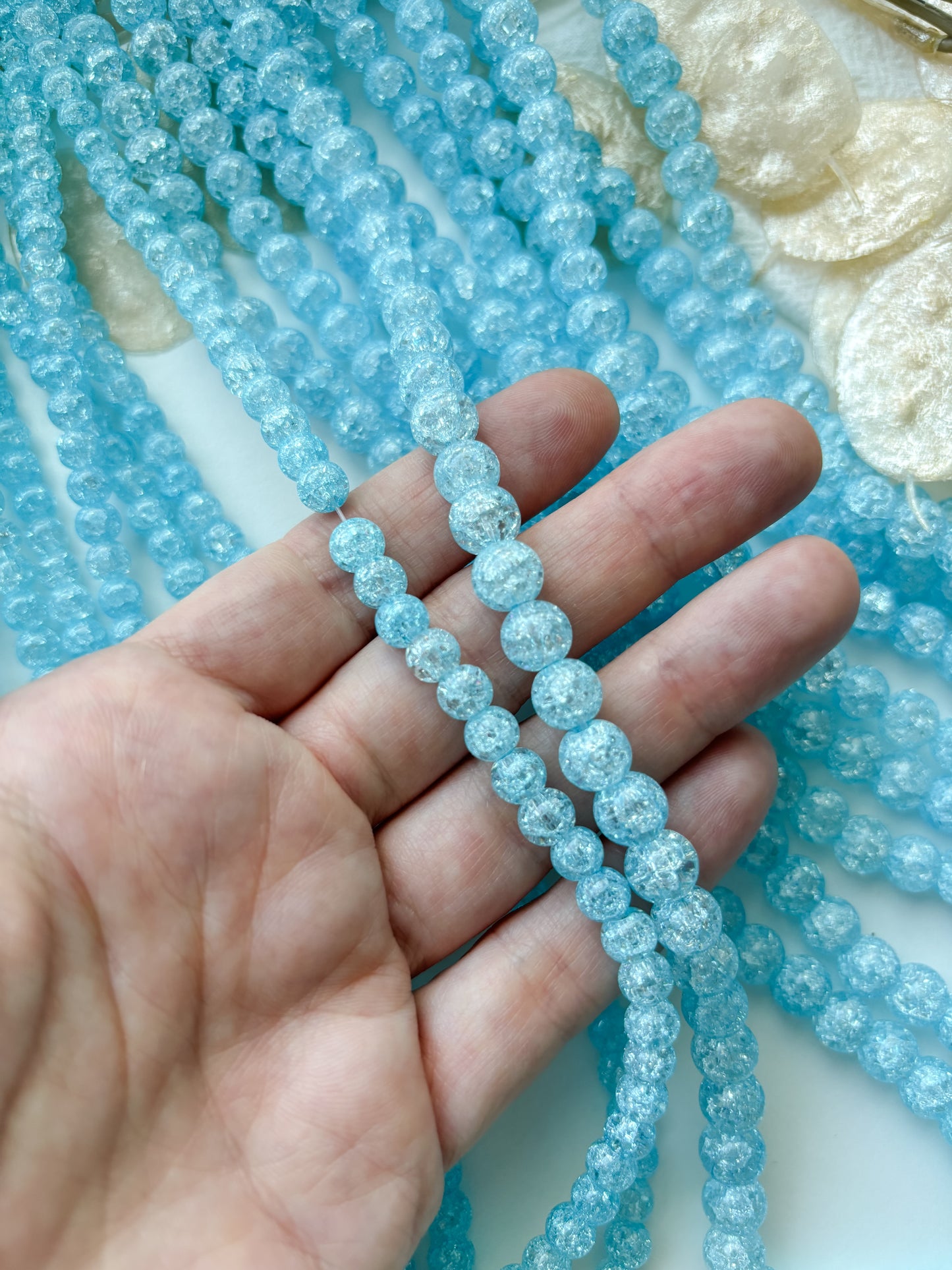 Glass bead, light blue