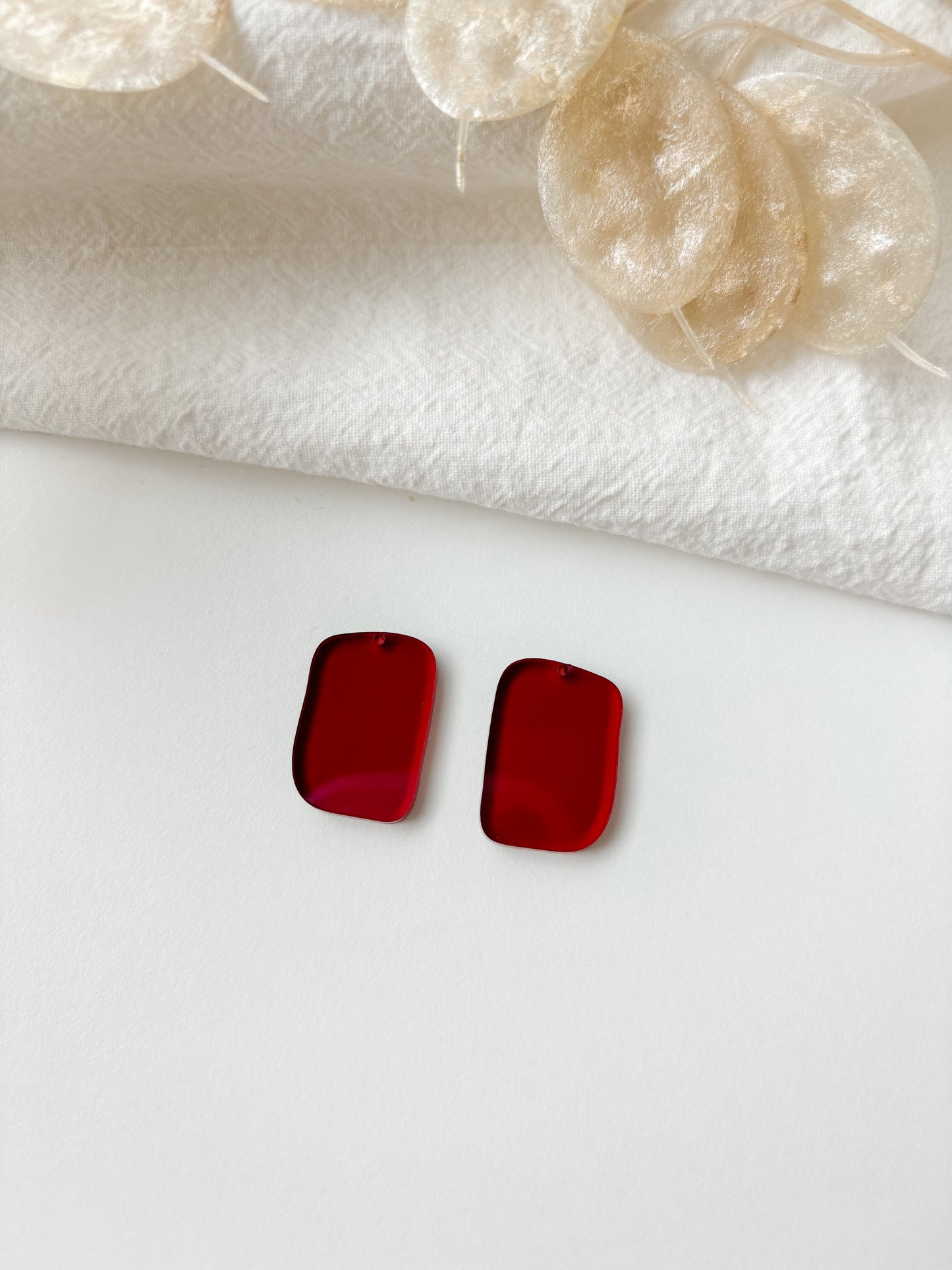 Pendant red transparent 25mm