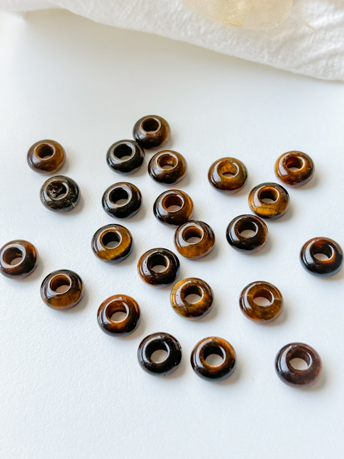 Bead tiger eye 10x4.5mm, 1pc