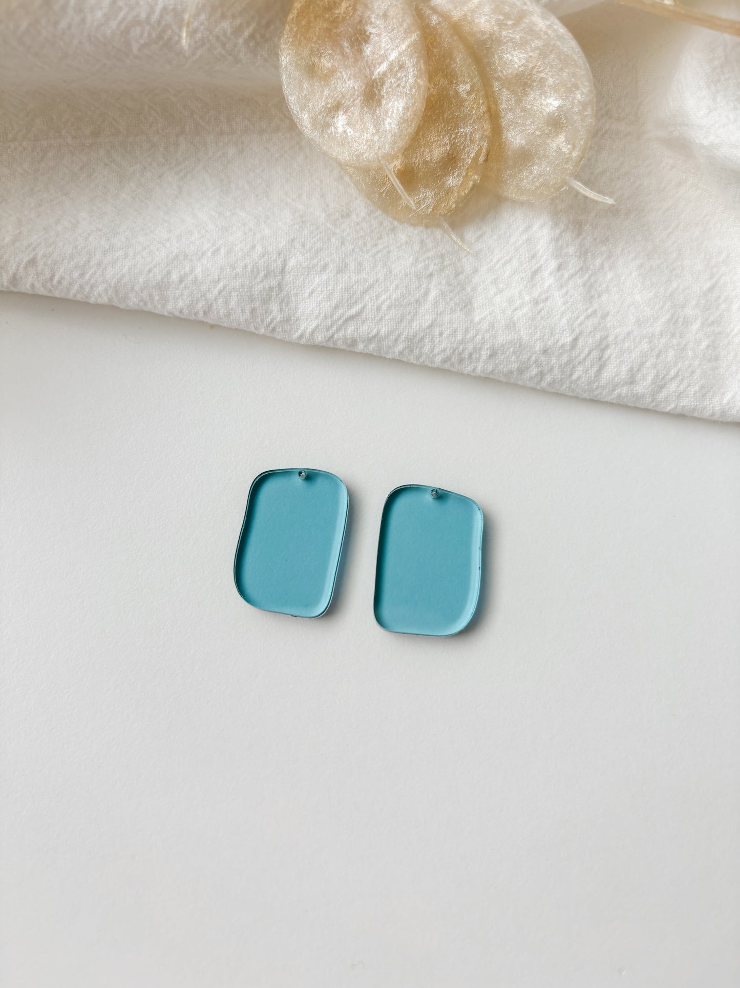 Pendant blue transparent 25mm