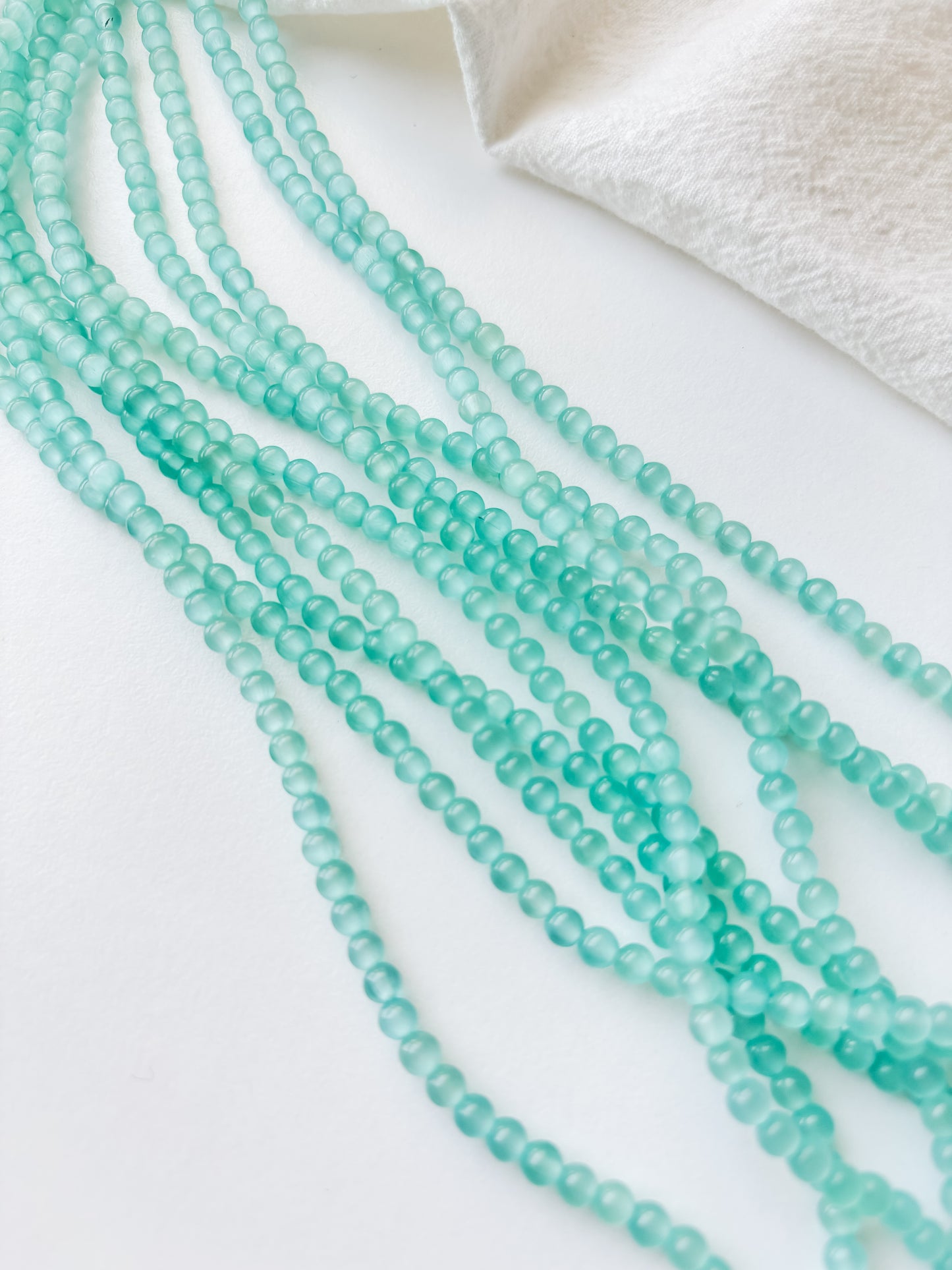Bead cat's eye 4mm, approx. 100pcs