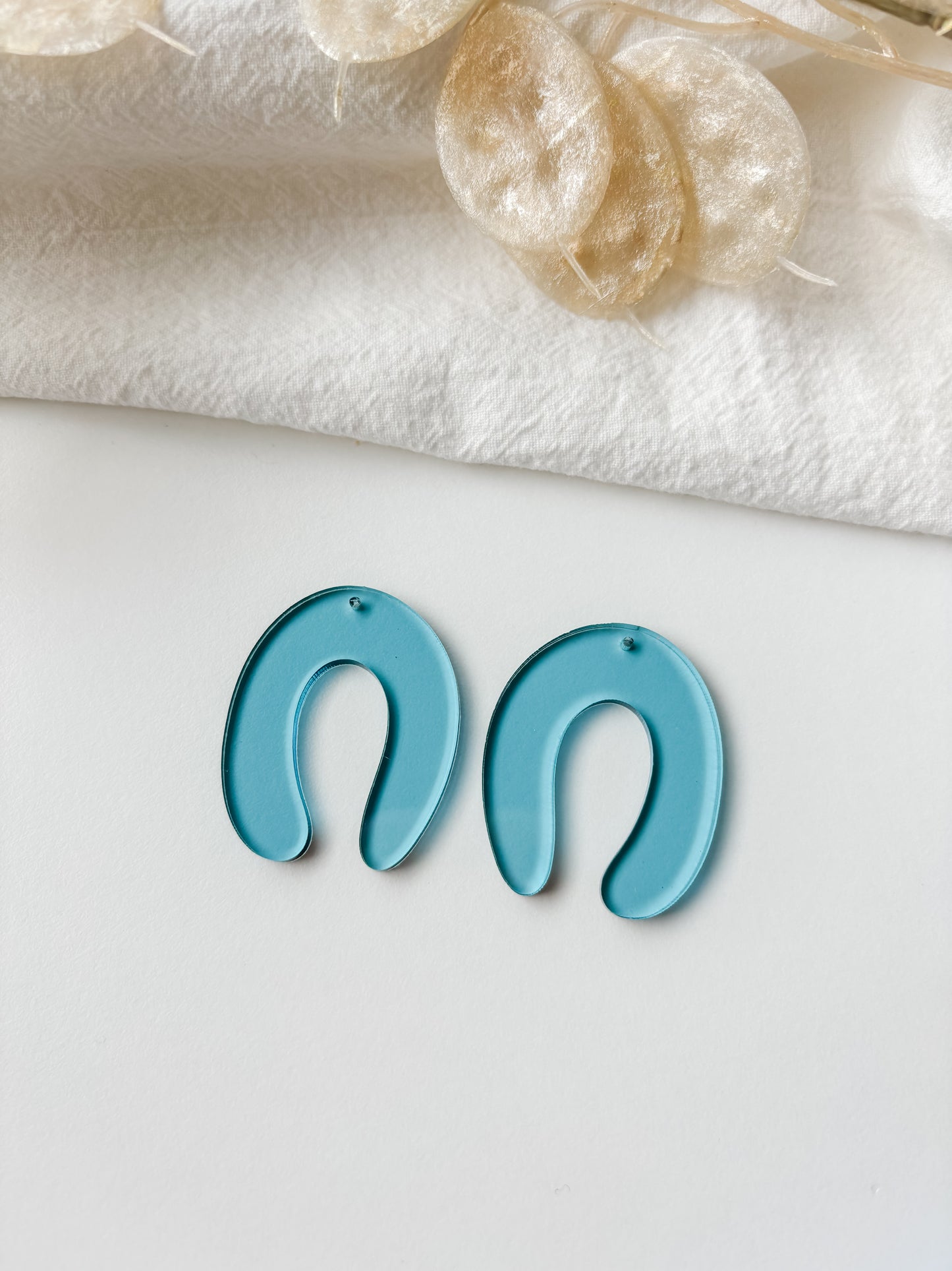 Pendant blue transparent 40mm