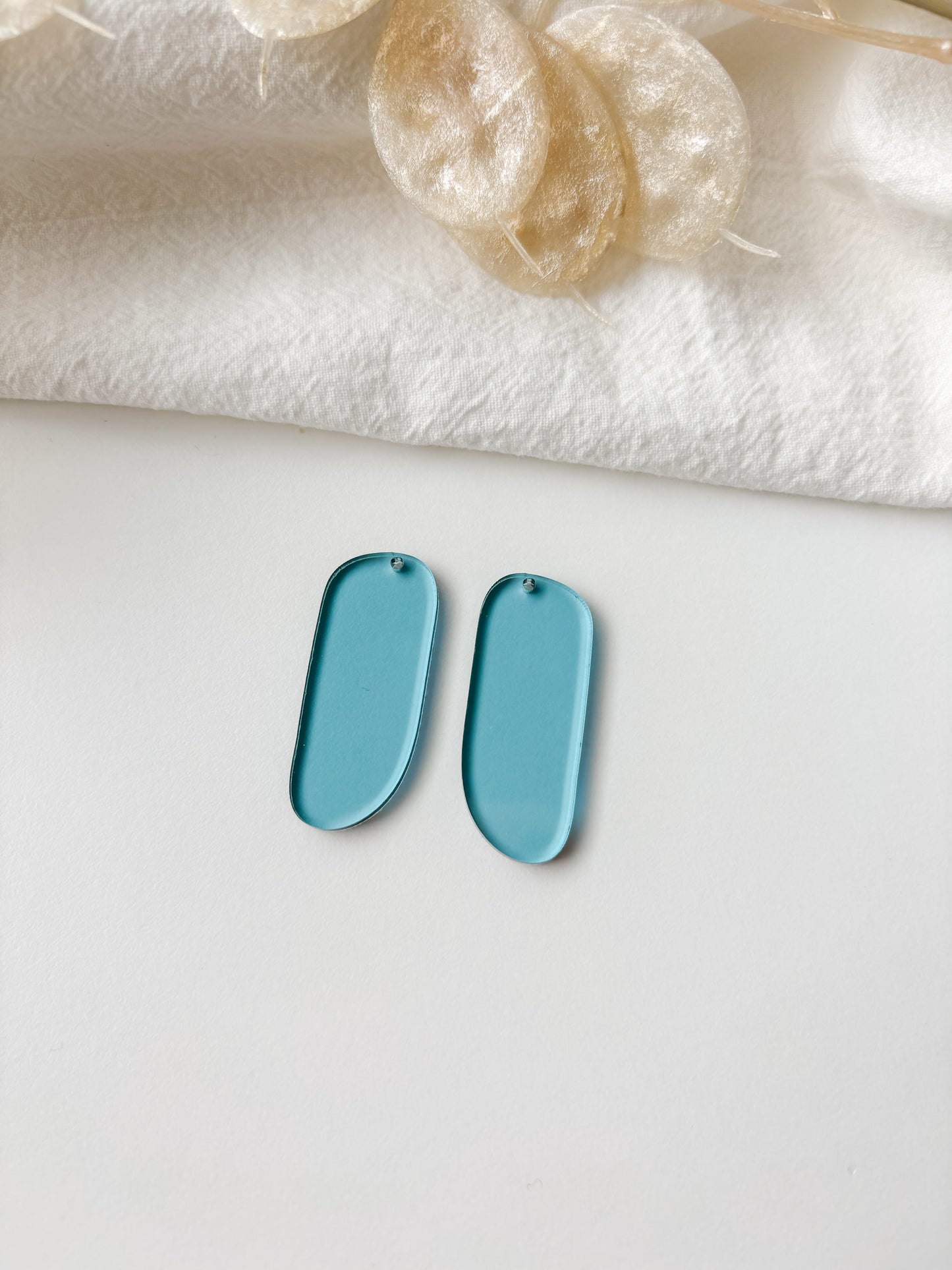 Pendant blue transparent 40mm