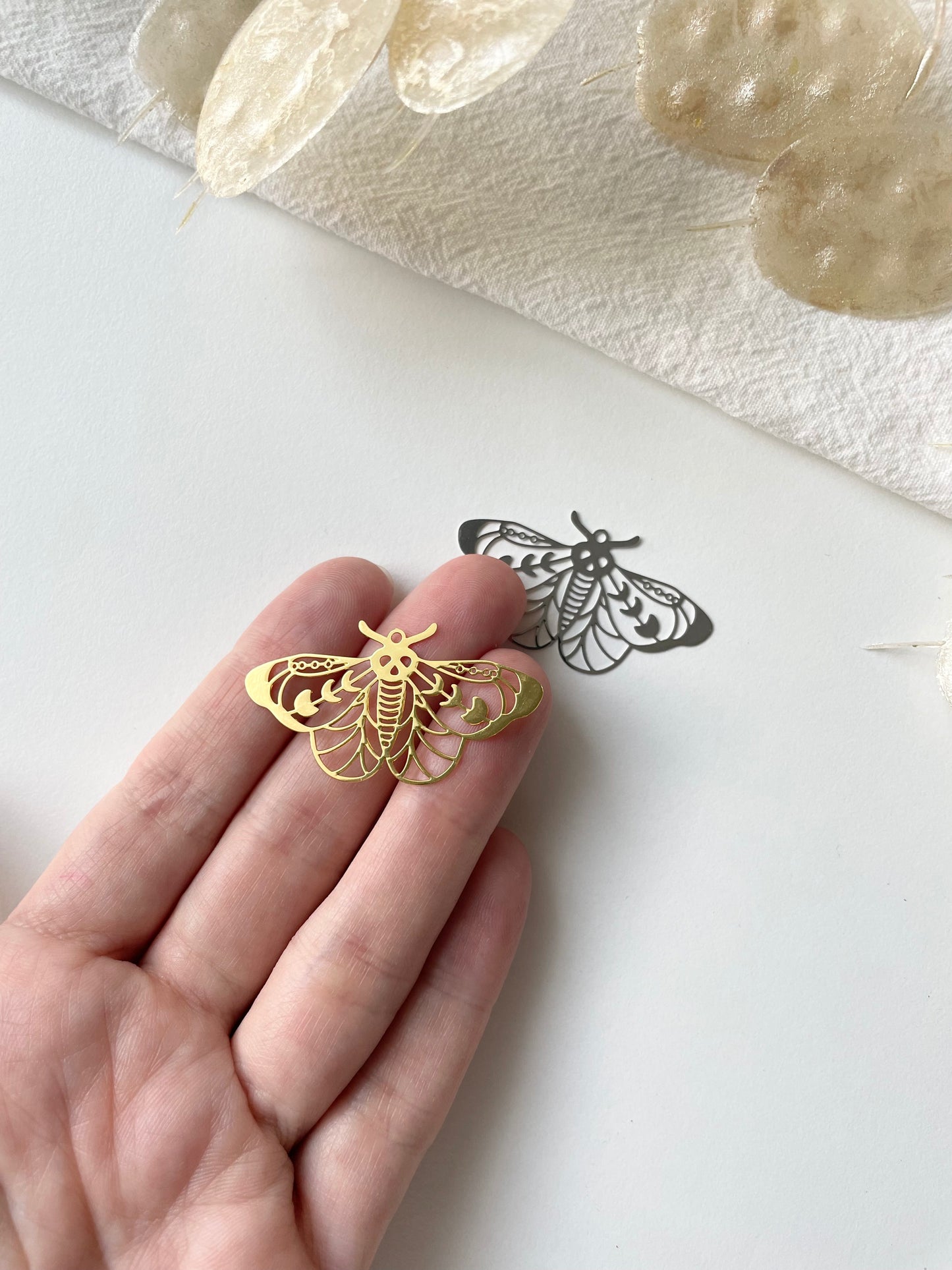 Hänge 40x22x0,3mm guld/silver 1st