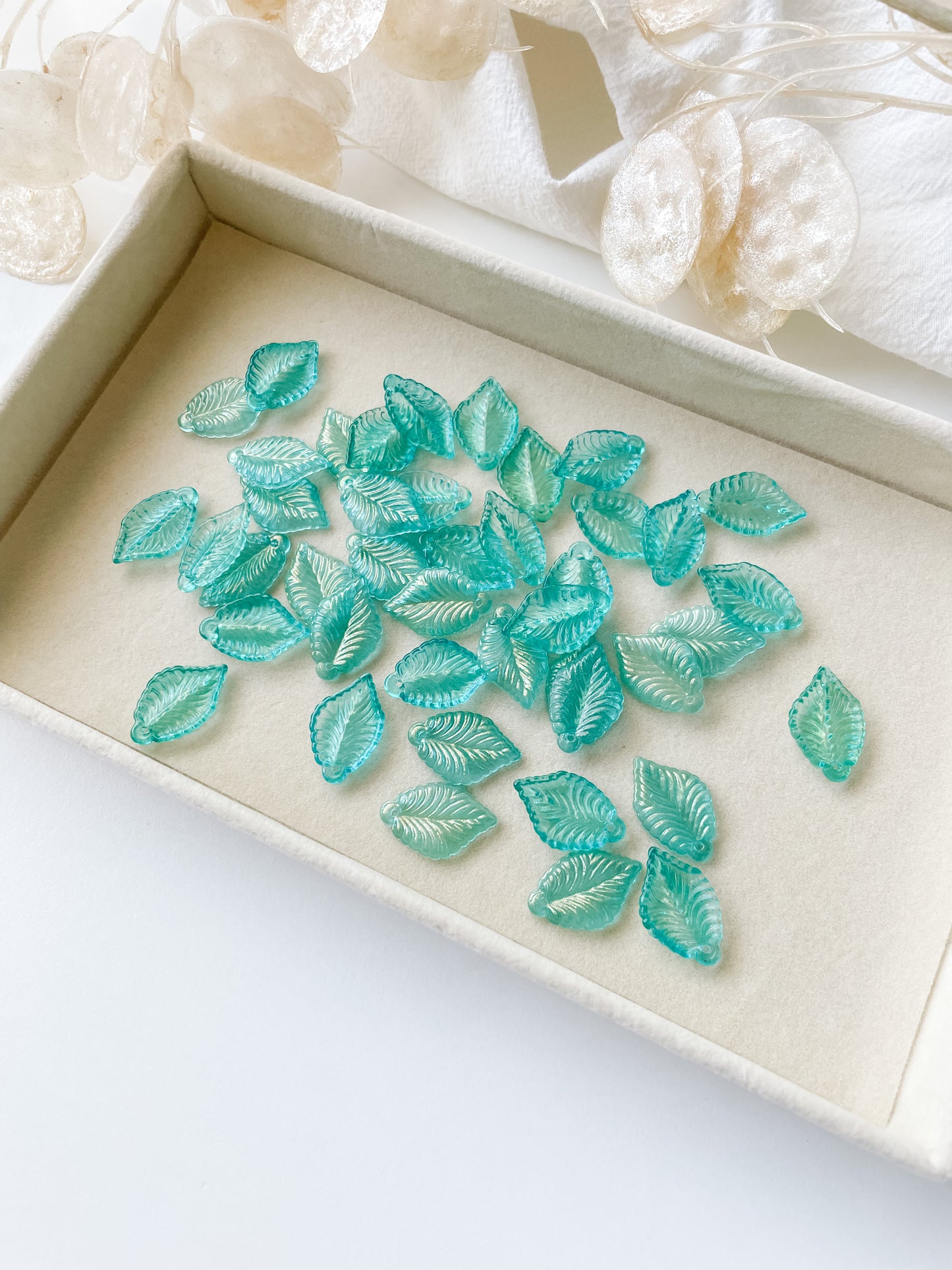 Glass pendant leaf, turquoise, 22.5x14.5x3.5mm, 1pc