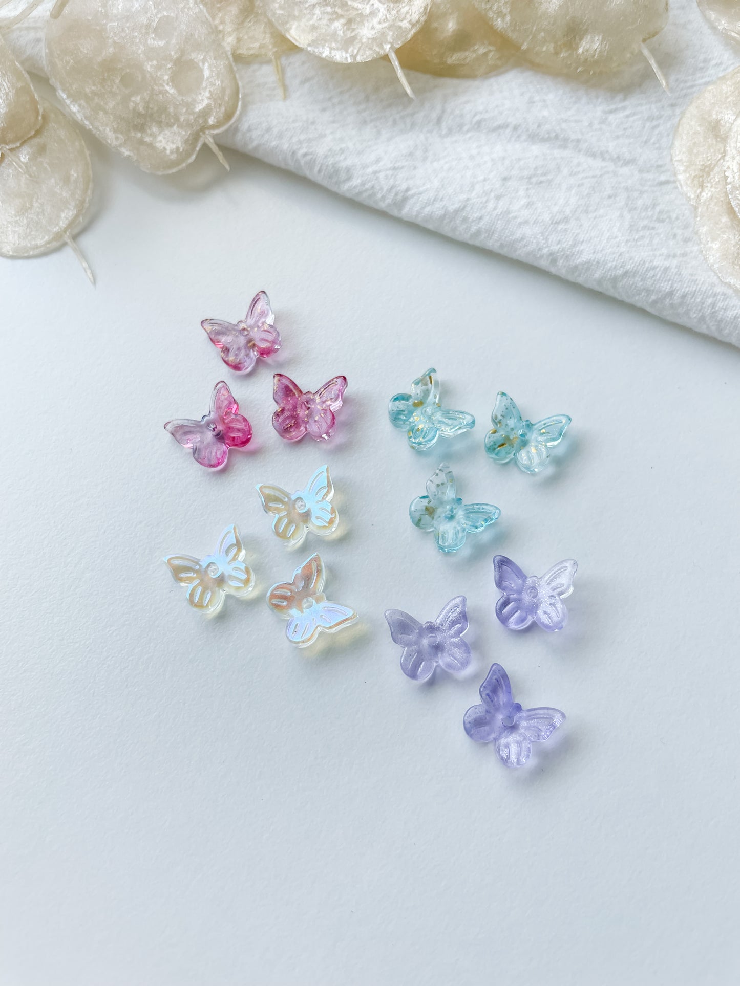 Pendant/bead glass butterfly 9.5x11x3mm 1pc