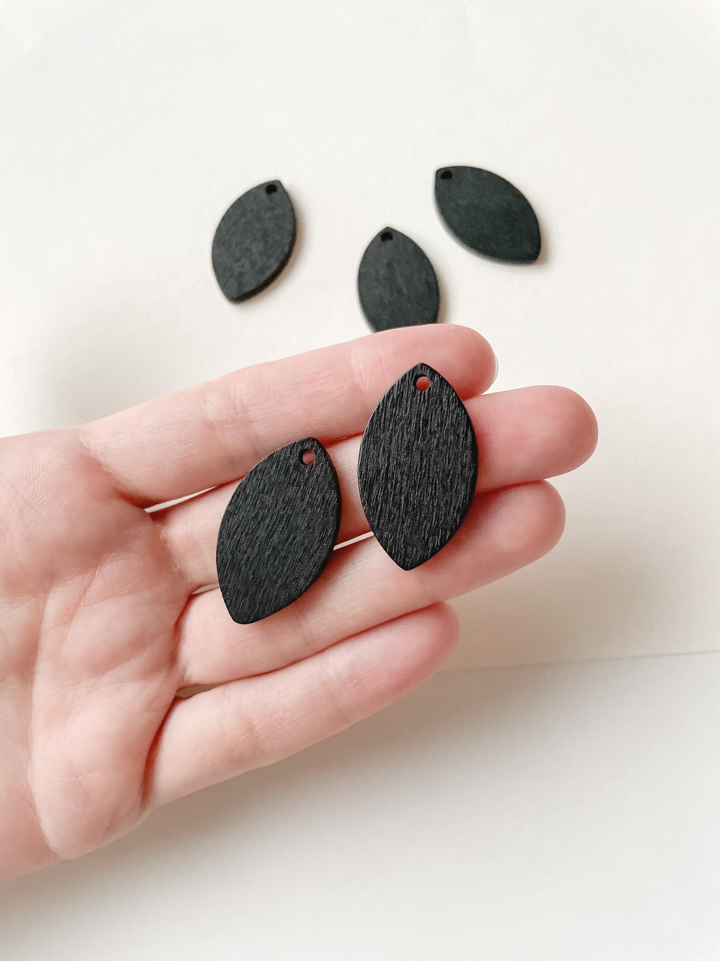 Wooden pendant black 32x18mm 6pcs