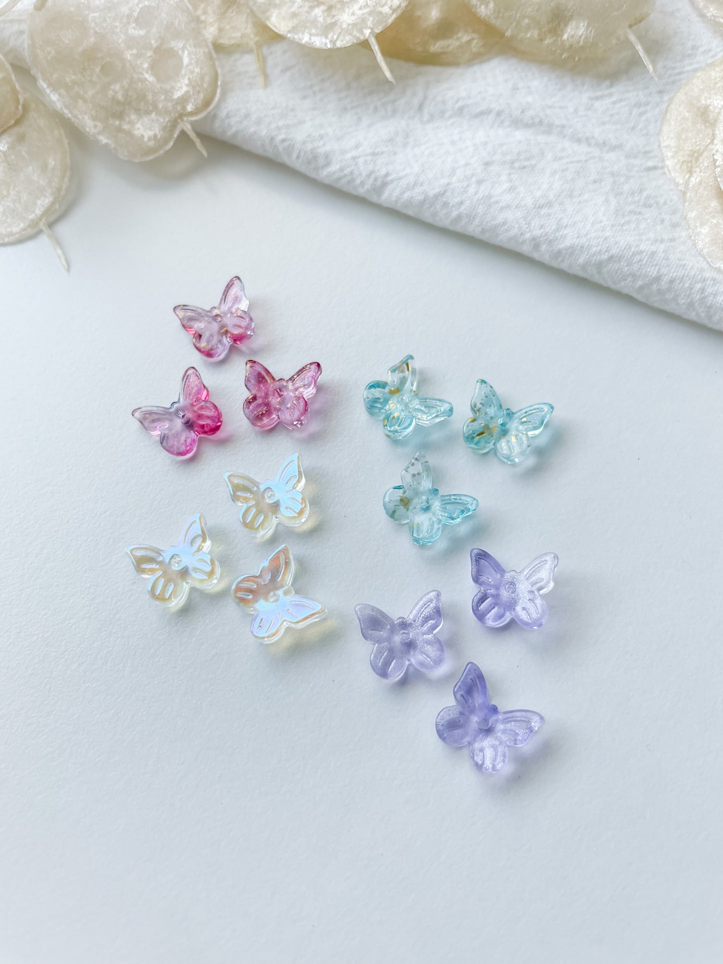 Pendant/bead glass butterfly 9.5x11x3mm 1pc